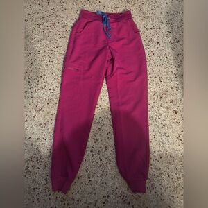 FIGS Women's Zamora High Waisted Jogger Scrub Pants in a raspberry sorbet XXS .